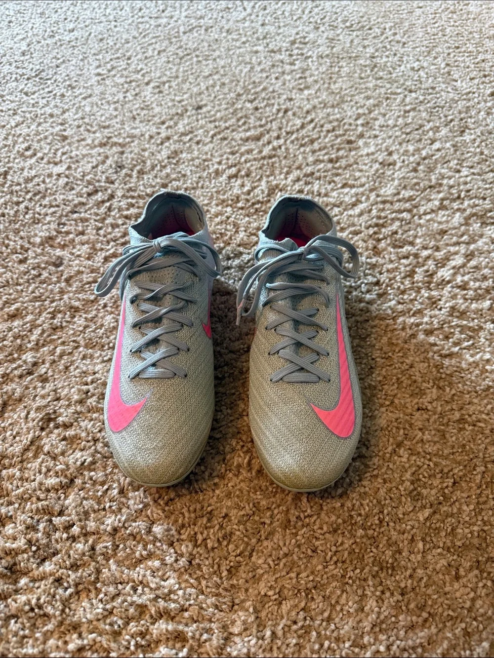 Nike Gray Soccer Cleats with Pink Swoosh